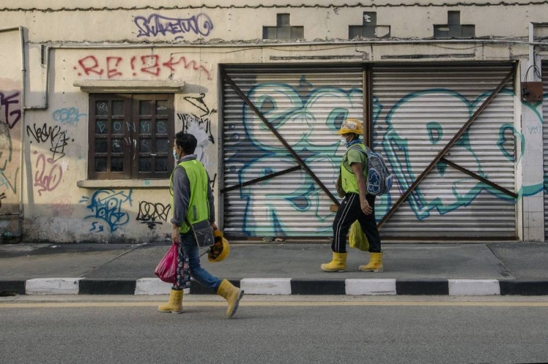 In Malaysia, migrants say they are in limbo after promised jobs fall through